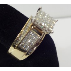 14 Karat Gold Ring w/round diamonds w/baguettes