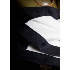 White Linen Napkin trimmed in black linen